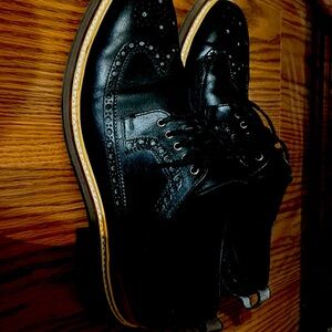 9.5 Cole Haan wing tips